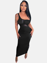 woman wearing a black one-shoulder ruched column gown with cut-out details