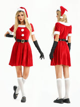 Woman wearing a red velvet Christmas dress with white trim, black belt, black gloves, white socks, and a Santa hat, shown from the front and back.