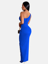 back view of a woman in a blue one-shoulder column gown
