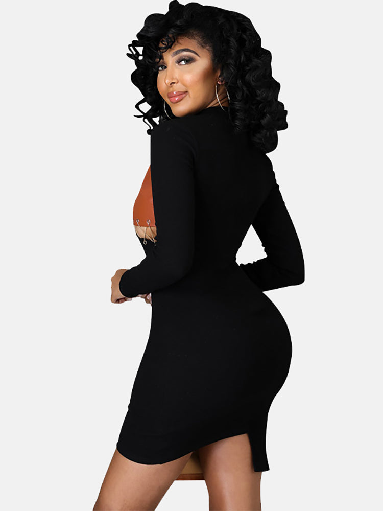 Back view of a woman in a black and brown faux leather color-blocked bodycon dress.