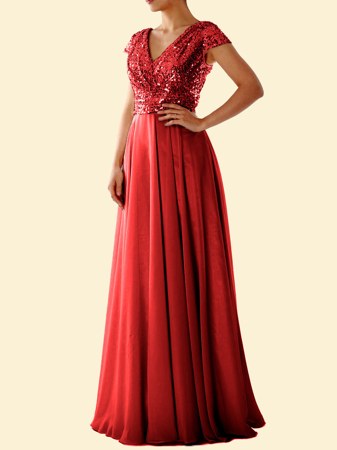 Woman wearing a red sequined formal dress with a flowing skirt