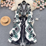 Elegant printed maxi dress with a belted waist - View 8 | Lwiis