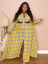 Woman wearing a yellow plaid maxi dress with a black belt