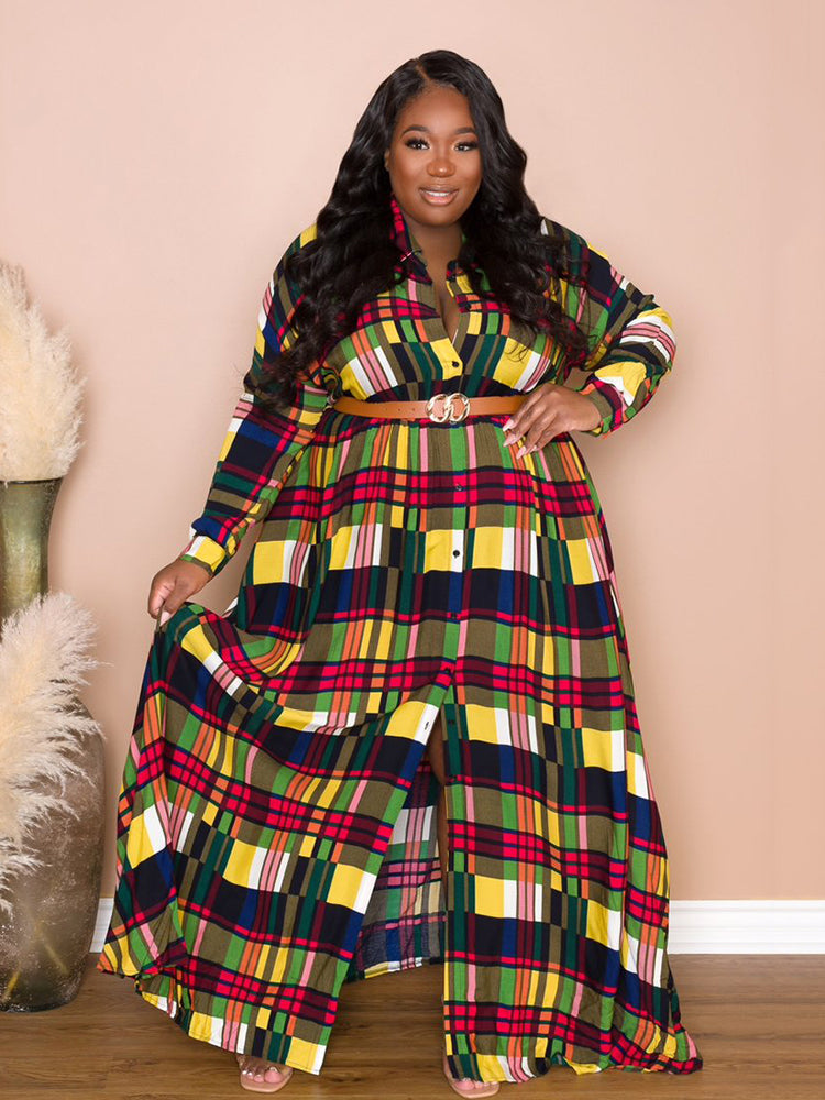 Woman wearing a colorful plaid maxi dress with long sleeves and a belt