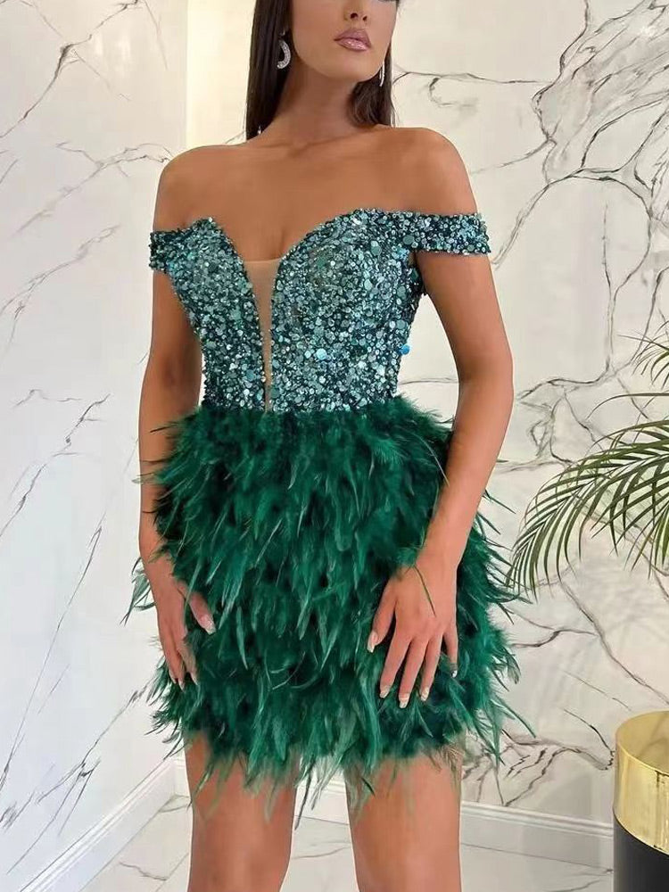 Close-up of the sequined bodice and mesh neckline detail.