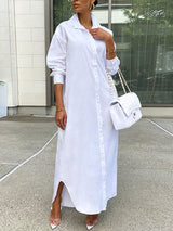 Woman wearing a long white button-down shirt dress with clear high heels