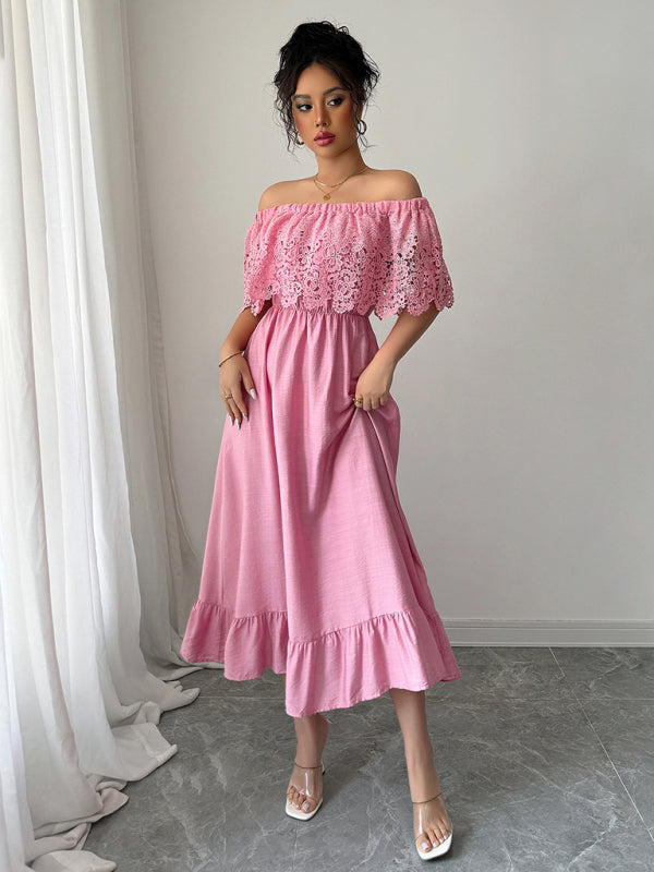 Woman wearing a pink off-the-shoulder maxi dress with lace bodice and ruffled hem, front view