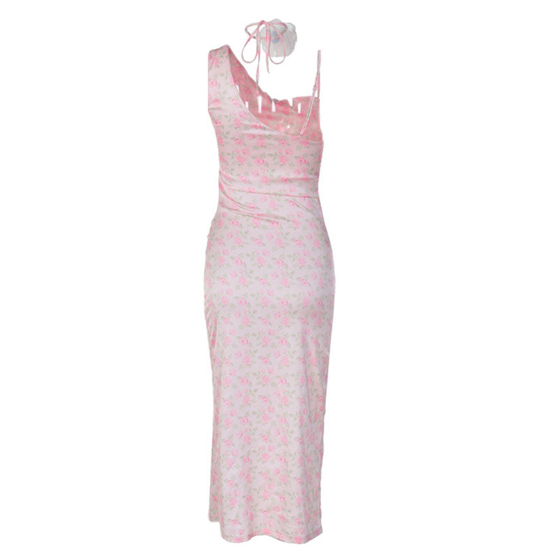 back view of a pink floral print satin slip dress with a high slit