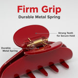 Close-up of a red claw hair clip highlighting the durable metal spring and strong teeth