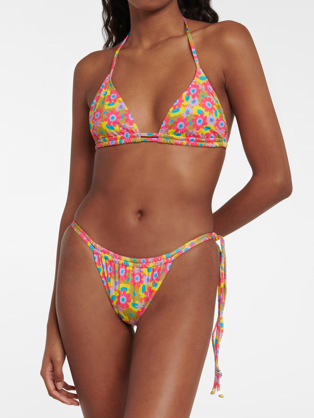 woman wearing a pink and yellow floral print bikini top and bottom, front view