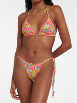 woman wearing a pink and yellow floral print bikini top and bottom, front view