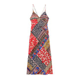 A colorful patchwork print maxi dress with spaghetti straps, shown flat.