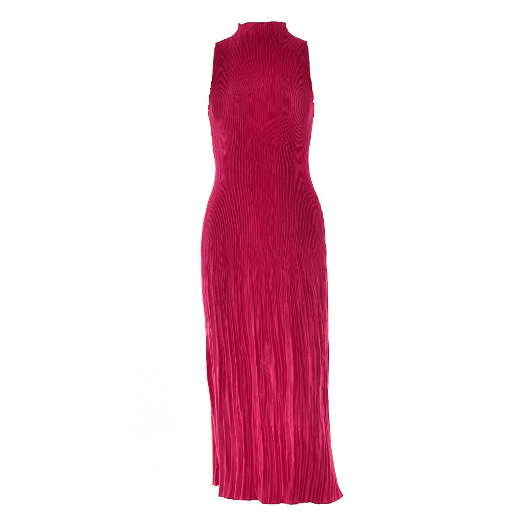 Back view of a woman in a deep pink sleeveless maxi dress with a mock neck and ribbed texture, showcasing her hairstyle