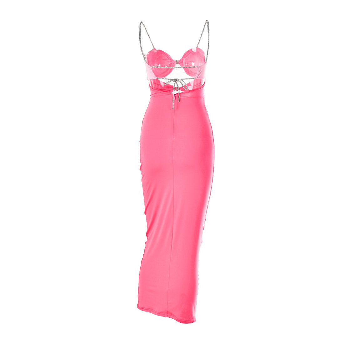 Back view of a pink and light pink color-block midi dress with cut-out details and bow embellishments, displayed on a white background.