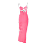 Back view of a pink and light pink color-block midi dress with cut-out details and bow embellishments, displayed on a white background.