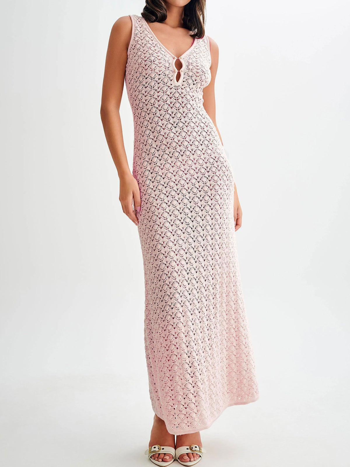 woman wearing pink crochet knit maxi dress with sandals