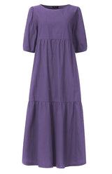 Front view of a purple tiered midi dress with puff sleeves