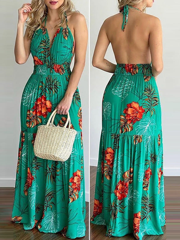 Front and back view of a woman wearing a green floral print maxi dress with a V-neck and halter neck.