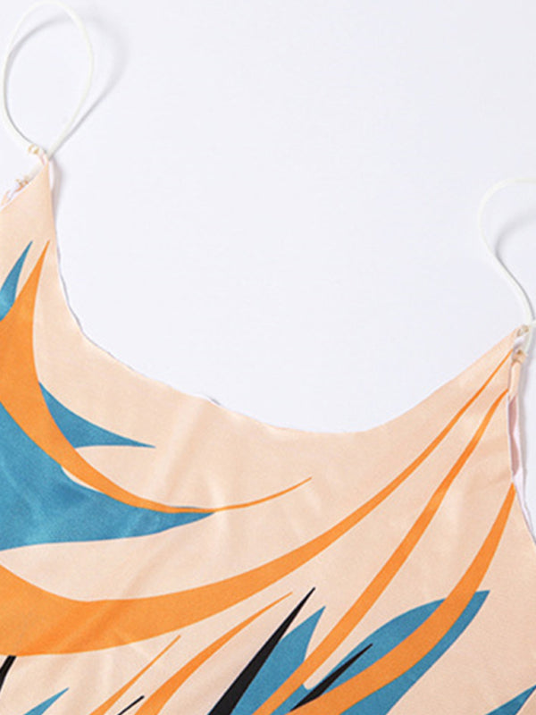Close-up of the spaghetti strap neckline with abstract print