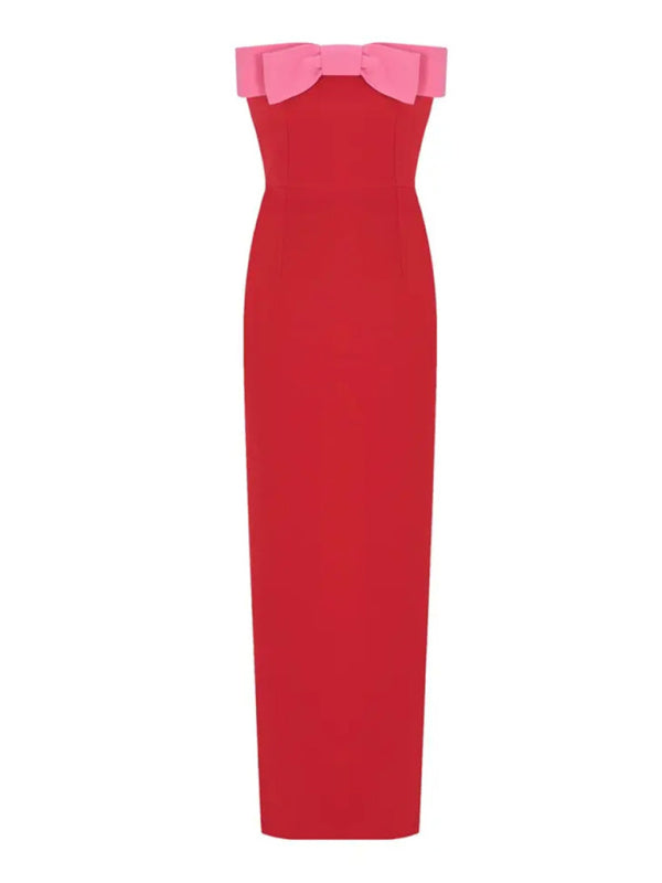 Front view of a red strapless midi dress with a pink bow accent.