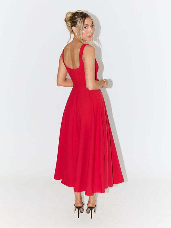 back view of woman in red fit and flare midi dress with square neckline