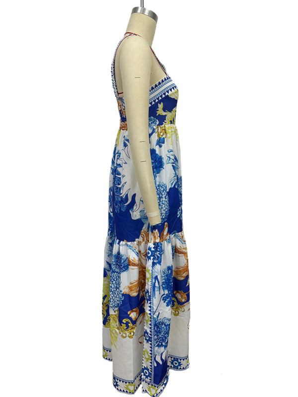 Blue and white floral print maxi dress on a mannequin, side view.