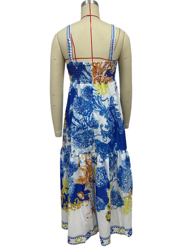 Blue and white floral print maxi dress on a mannequin, back view.