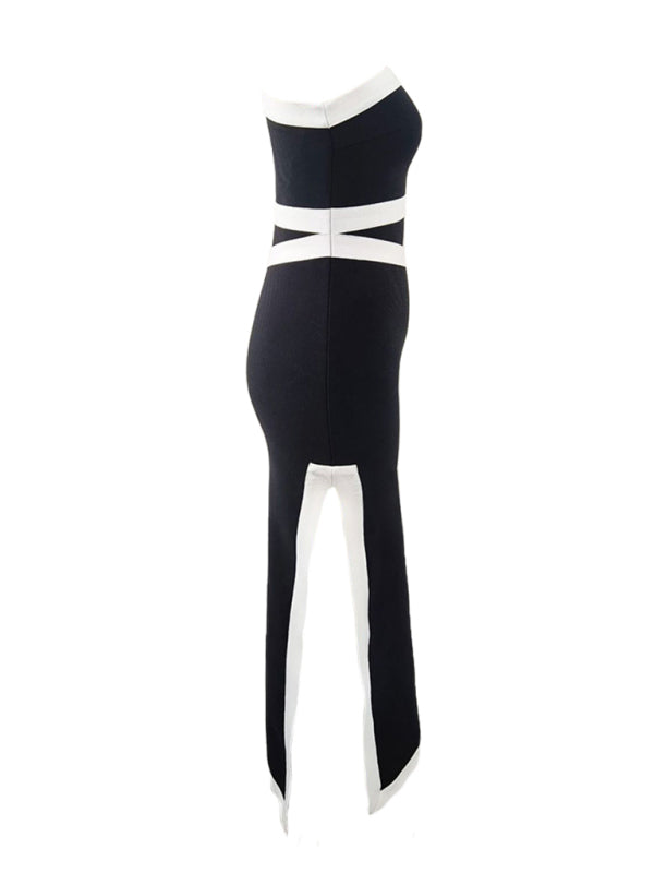 back view of a black and white one-shoulder midi dress with contrast trim