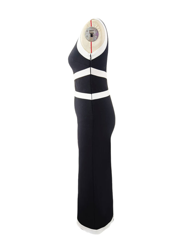 profile view of a black and white one-shoulder midi dress with contrast trim