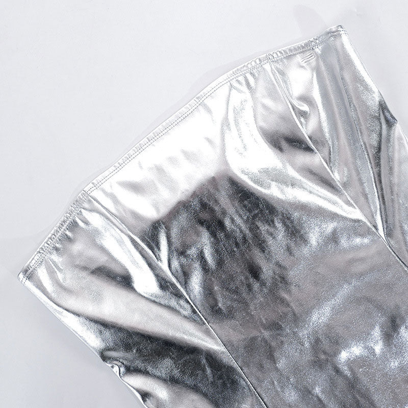 close-up of the strapless neckline of a silver metallic faux leather dress
