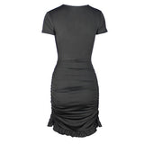 back view of a black short-sleeve ruched bodycon dress with a tie-front neckline and ruffled hem