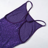 Close-up of the back of a purple sequined dress, showing adjustable spaghetti straps and the sequined fabric.