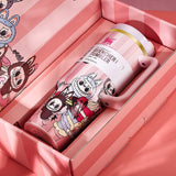 The Stanley x Labubu Quencher H2.0 Tumbler nestled within its pink striped packaging, highlighting the product and its presentation.