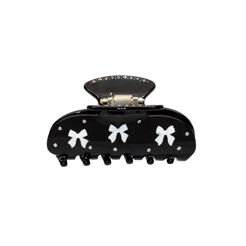 black claw clip with white bows and rhinestones