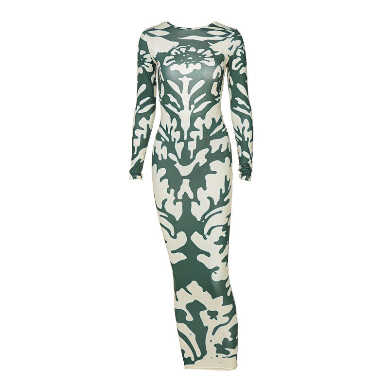 Front view of a long-sleeved, bodycon maxi dress with a green and cream abstract print.