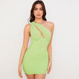 Woman wearing a lime green one-shoulder ruched mesh mini dress, front view